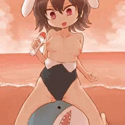 砂浜で鮫の人形にまたがるてゐ