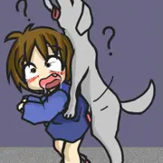 犬にじゃれつかれる少女