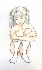 しゃがむ少女