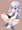ココアのカップにまん汁を注ぐチノちゃん