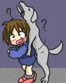犬にじゃれつかれる少女